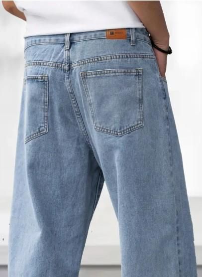 Men's Loose Fit Mid Rise Light Blue Jeans.